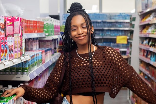 Woman smiling in the supermarket